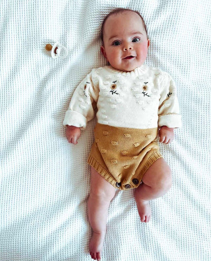 Sunflower Romper - warmth, comfort and irresistible charm